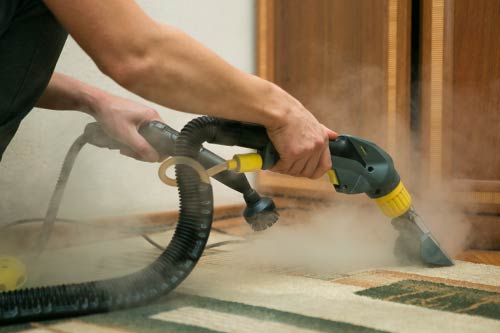 cleaning carpet with machine